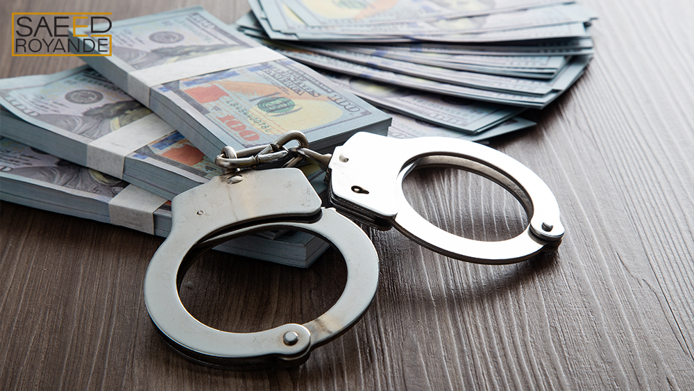 Money and handcuffs concept for corruption fraud