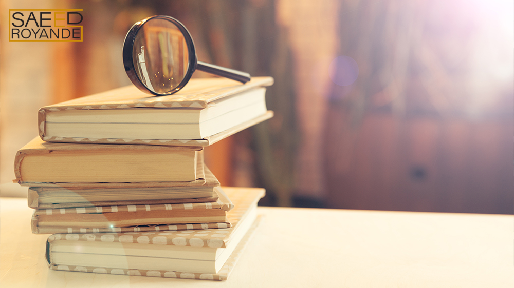 Book and Magnifying glass