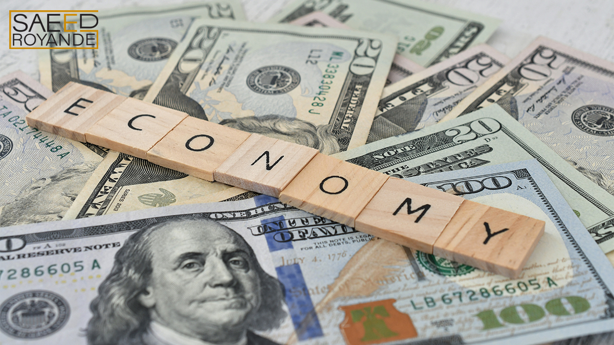 The word economy spelled out in wooden letter tile