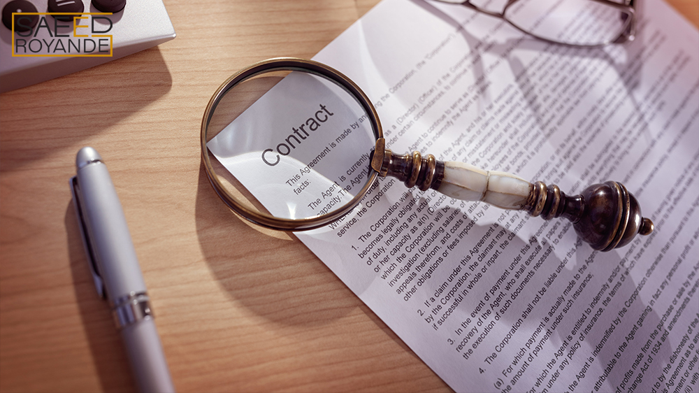 Magnifying glass on a legal contract