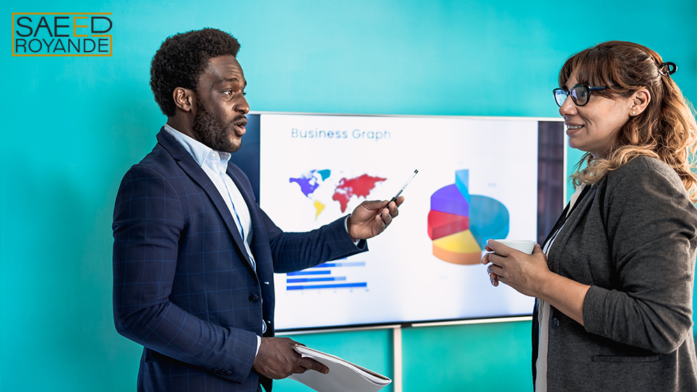 Multiracial people presenting business analytics