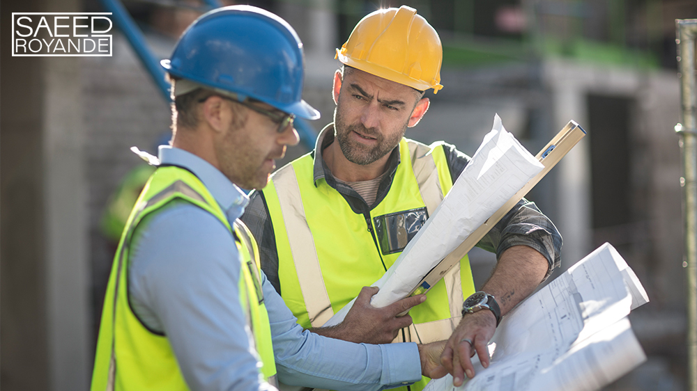 Project manager and construction worker