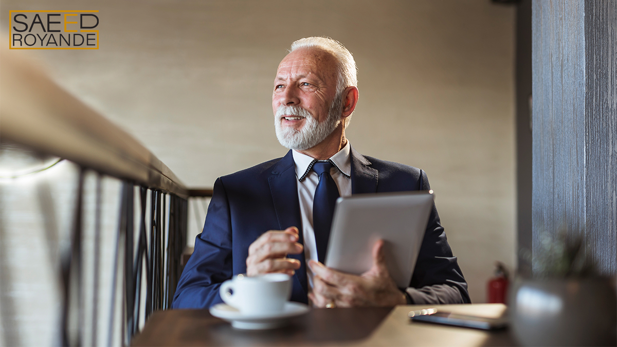 Senior businessman working in a restaurant