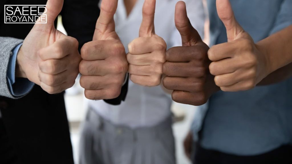 Diverse business team people hands showing thumbs