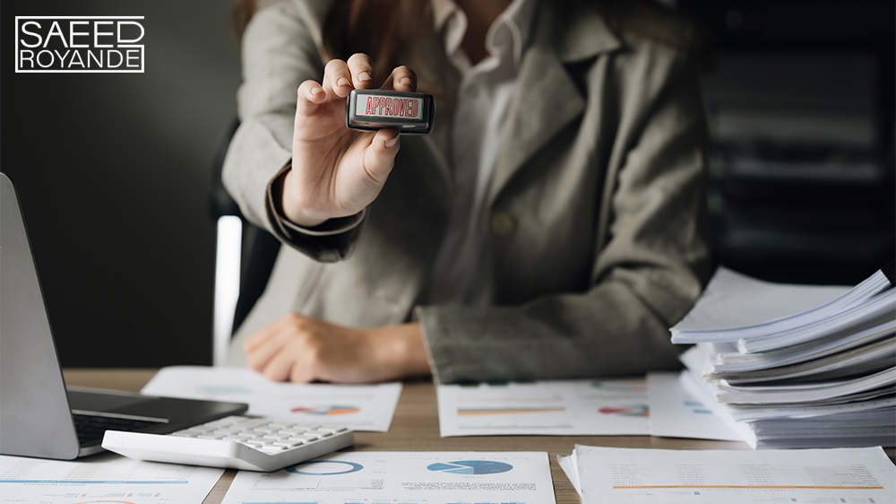 Business accountant woman hand stamping on approve