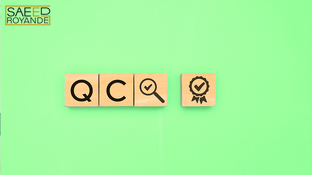 Quality control text icon on wooden cube